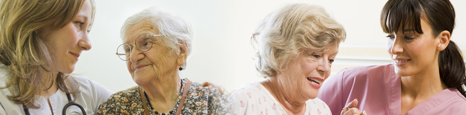 caregivers and senior patients smiling